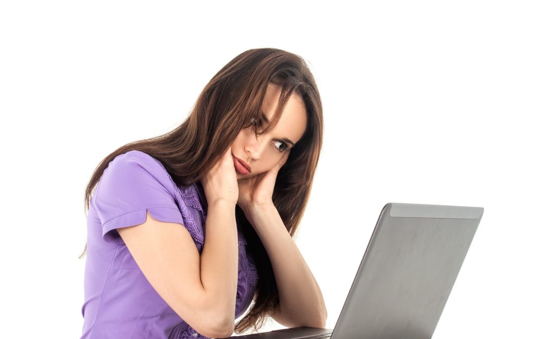 Girl sits a computer